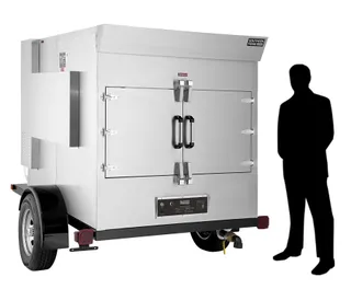 SP-700 mobile smoker, right side, shown beside a person for scale