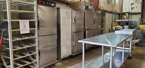 Used restaurant equipment 3: stainless steel holding cabinets and a sheet pan rack