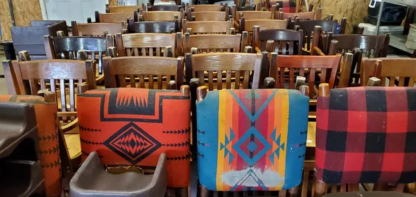 Used restaurant equipment 6: stacked wooden restaurant chairs
